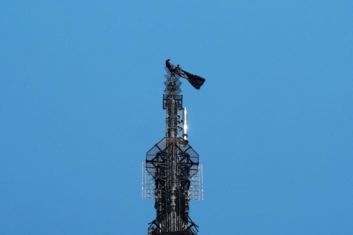 CNN stopped cold as masked activists scale Empire State Building with a blunt message