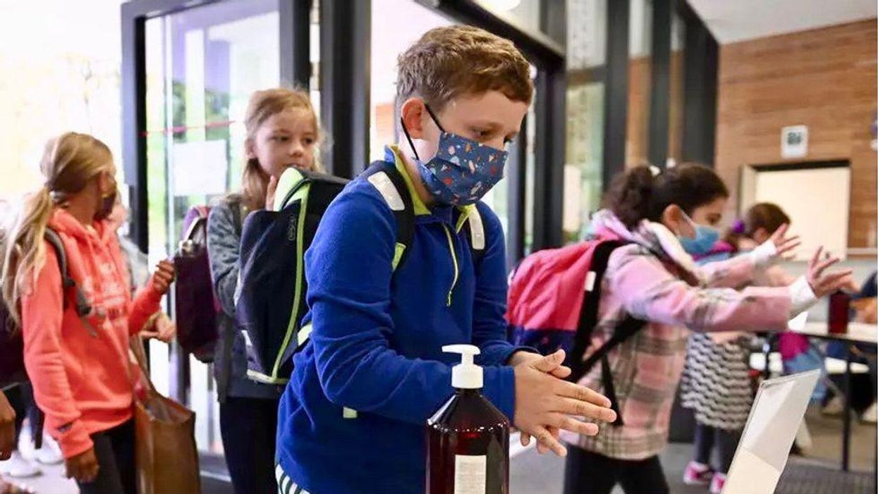 Federal judge temporarily blocks Iowa ban on school mask mandates