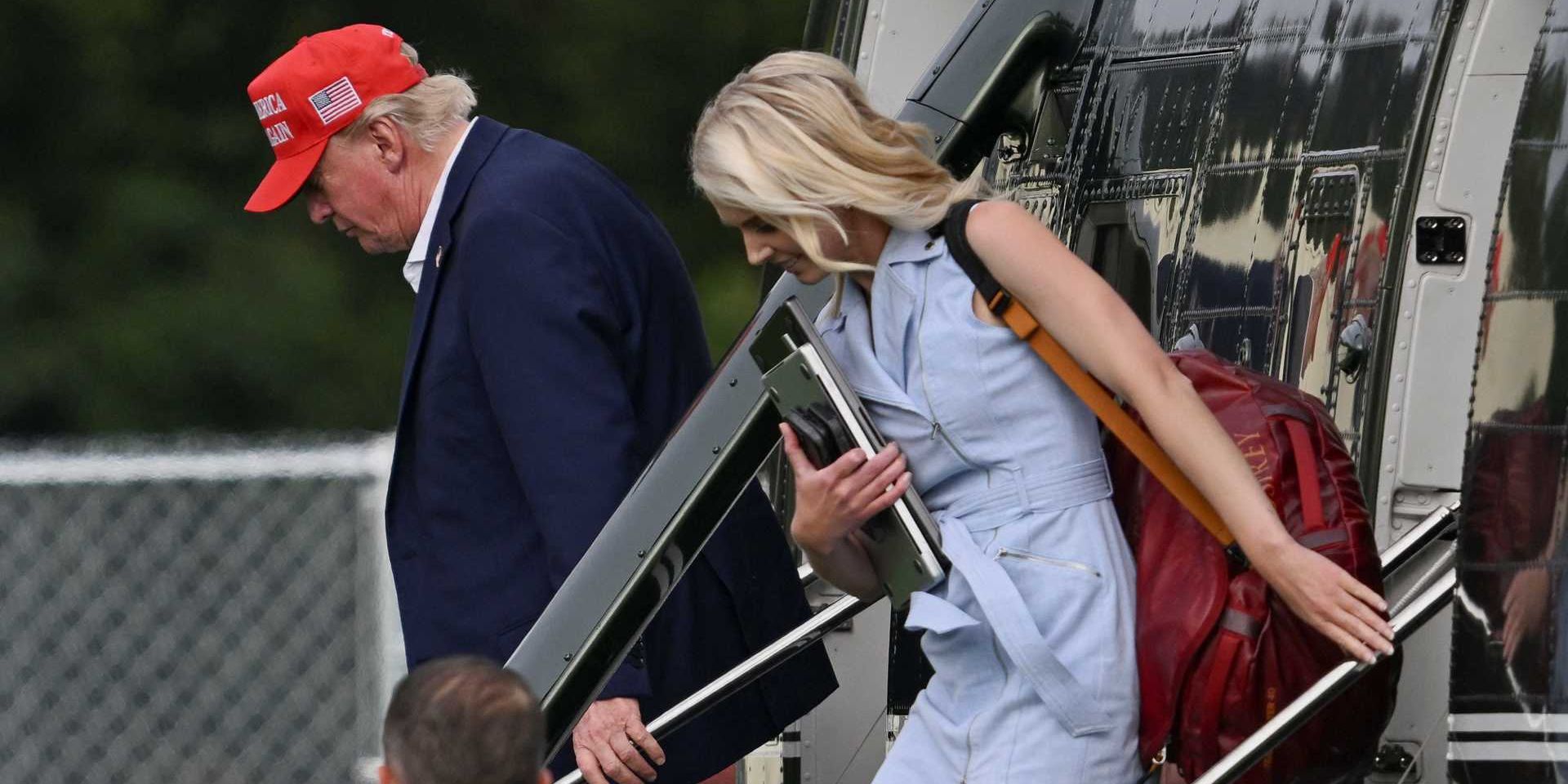 Trump caught with mouth agape due to Natalie Harp distraction during game