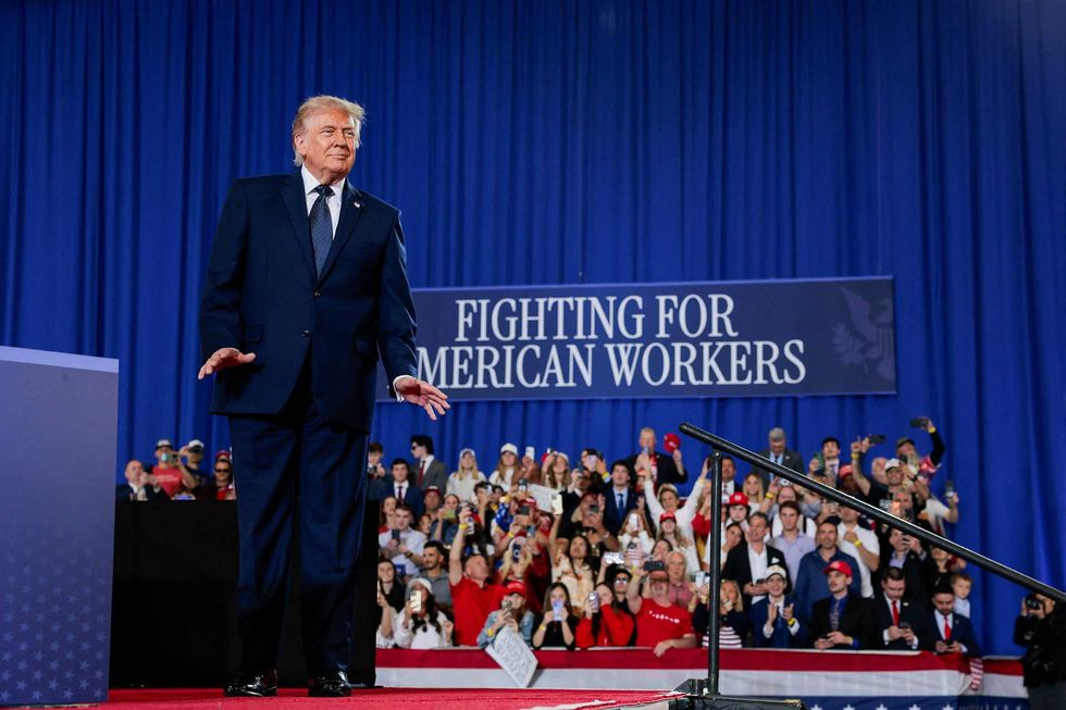 'Don't hurt him!' Trump taunts crowd as he's repeatedly interrupted by protesters