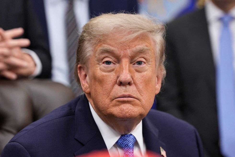 'This is a bit much': Onlookers recoil as Trump's scowl hits new US passports