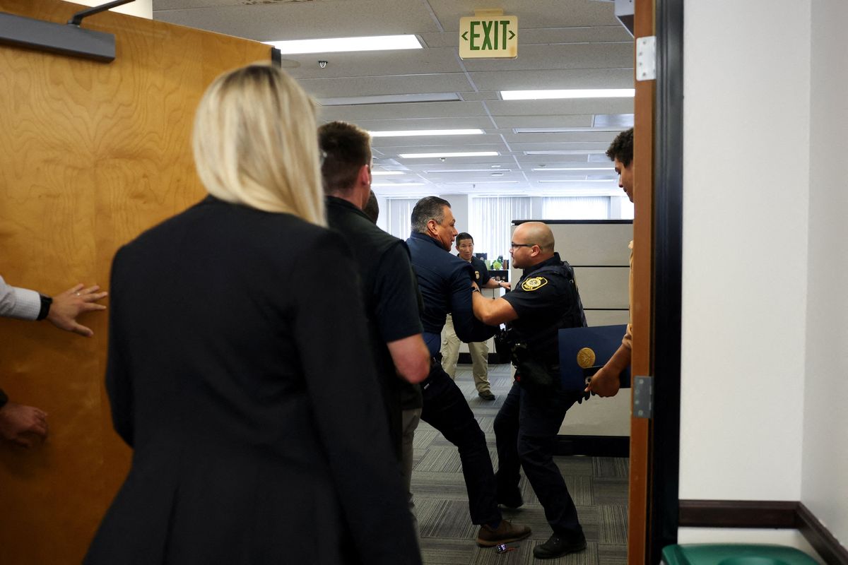 'Sickened my stomach': Lawmakers livid after senator 'dragged and handcuffed'