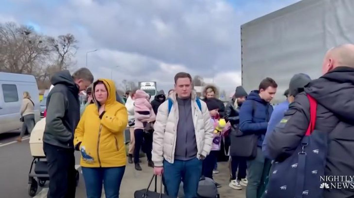 Footage shows Ukrainians seeking shelter and fleeing country as Russia attacks