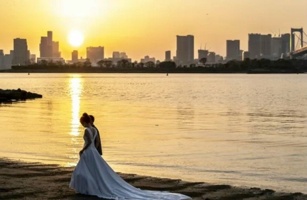 Japan couples file suit seeking separate surnames