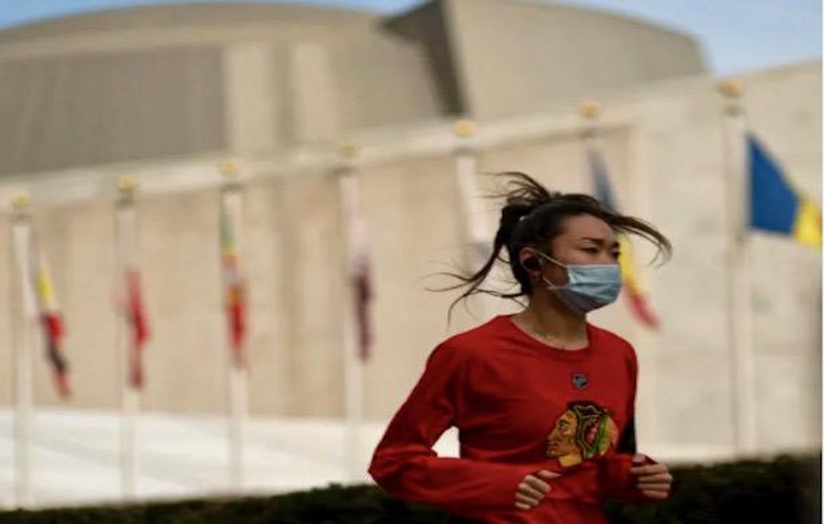 Vaccinated Americans don't need masks outdoors away from crowds: official
