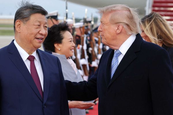 Alarm as Trump 'winces in pain' during military flyover: 'Global embarrassment'