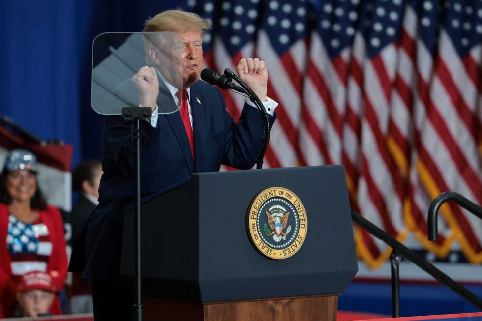Trump ogles at celebrity's 'beautiful' rear end during Michigan rally: 'Hard to miss!'