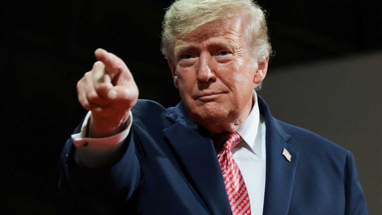 Trump repeatedly interrupted by protesters amid election screed in Kansas
