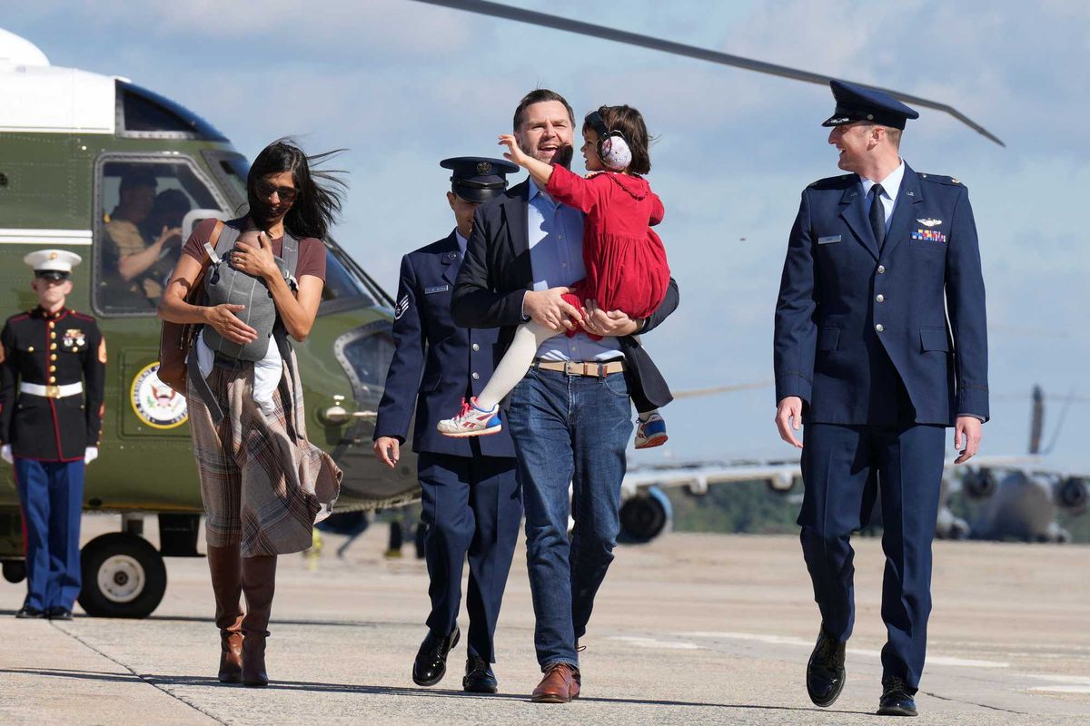 Usha Vance nearly tumbles down helicopter stairs while carrying infant son