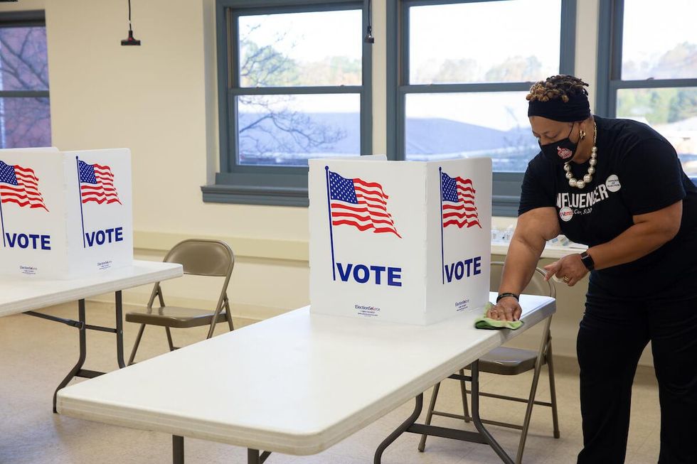 Conservative-trained army of poll watchers worries Democrats: 'Goal is to disenfranchise'