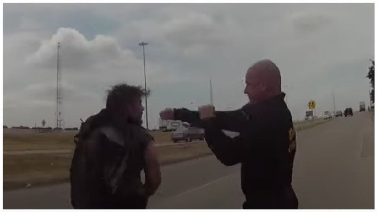 MMA-trained paramedic seen kicking and punching a homeless man will get his job back