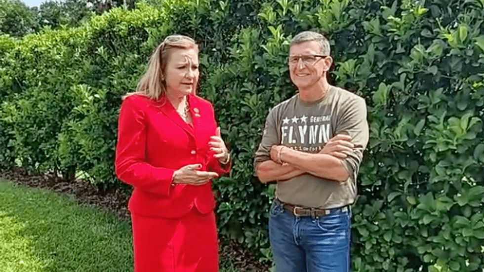 'She's savvy': Mike Flynn endorses far-right Republican who pushed Trump to invoke Martial Law