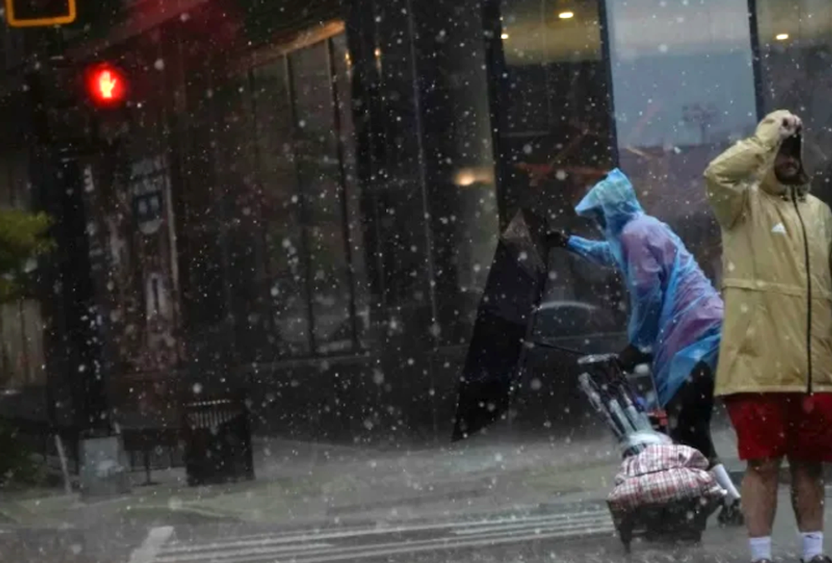 Two dead, thousands without power as storms batter eastern US