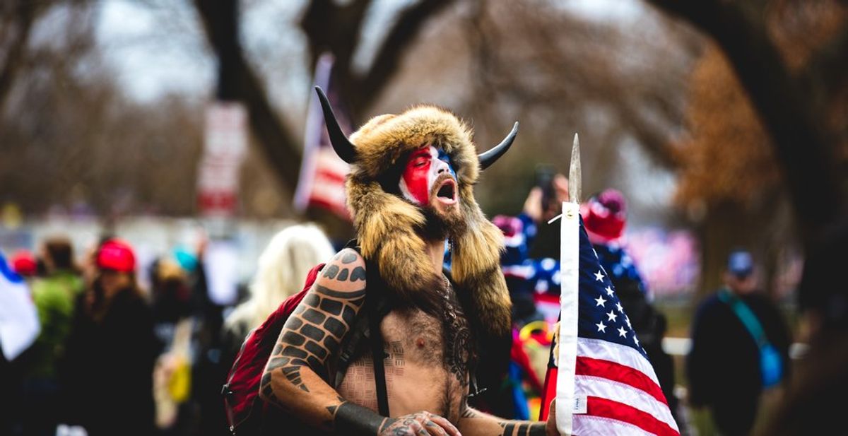 'Fraud': 'QAnon shaman' turns on Trump with profane post