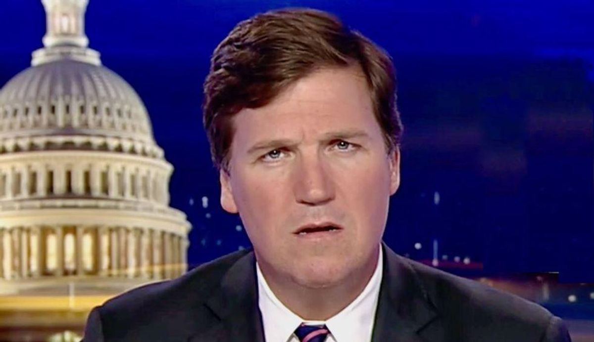 Tucker Carlson torn apart on CNN for spouting racist theory 'embraced by killers' and 'used for hate'