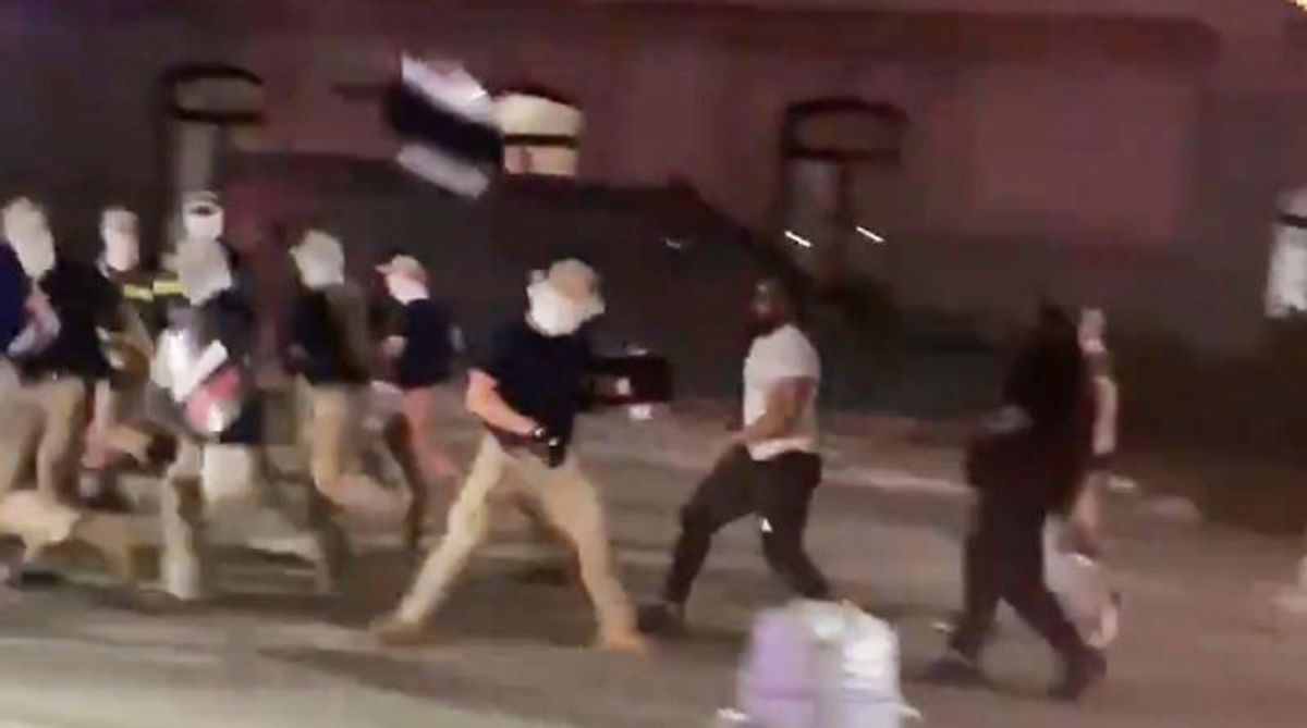 WATCH: Onlookers chase white supremacists marching in front of Philadelphia City Hall