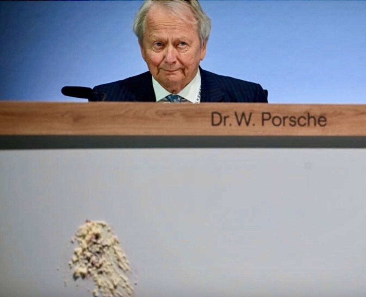 Protesters throw cake at Volkswagen shareholders' meeting