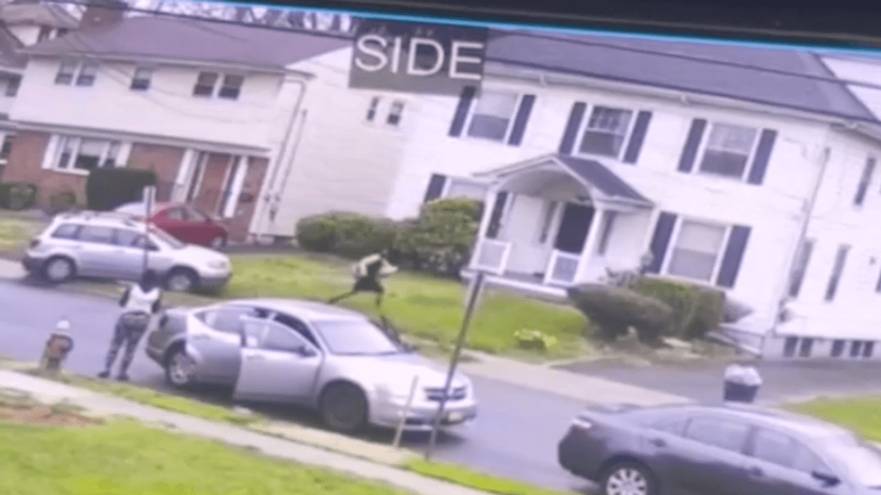 Horrific road rage attack caught on video as man repeatedly runs over fleeing woman