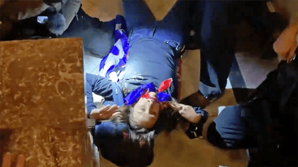 Woman shot during Trump riot inside capitol has died: report