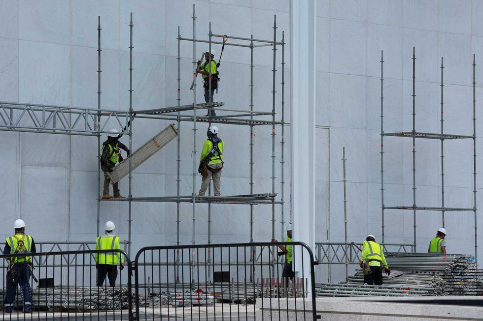 WATCH: Workers finally tear Donald Trump's name off Kennedy Center