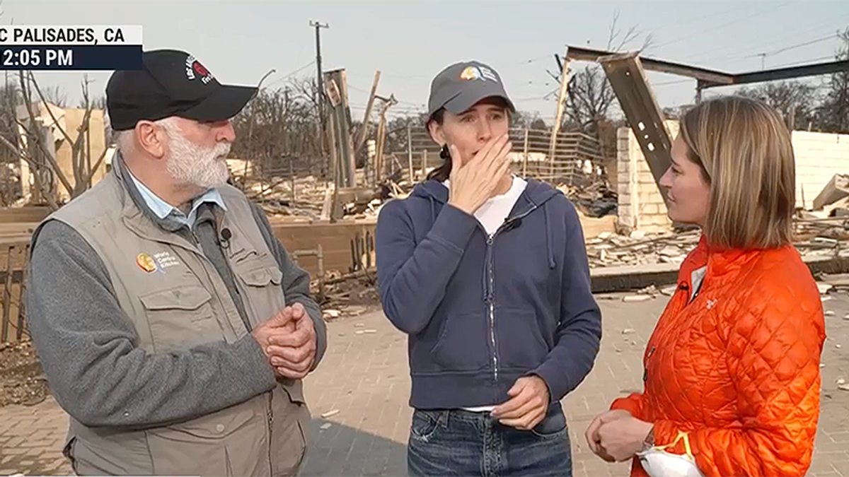 Jennifer Garner holds back tears in rubble of old neighborhood and says friend likely died